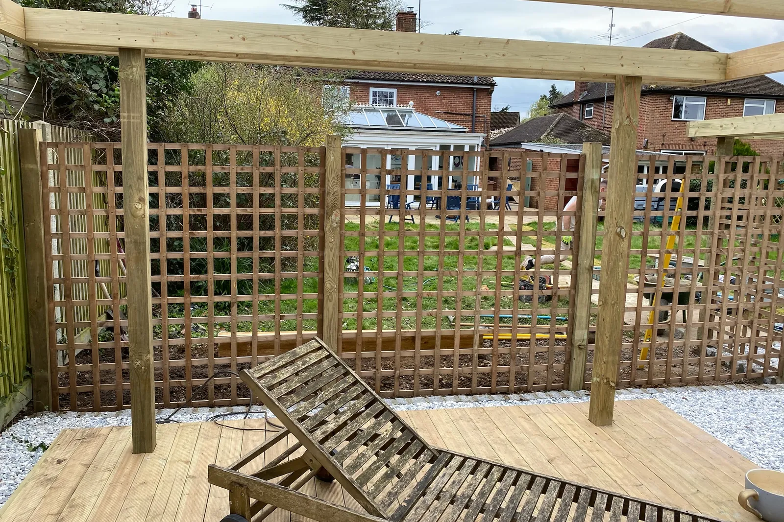 Timber deck under a pergola with trellis screens, Earley, Reading, 2024