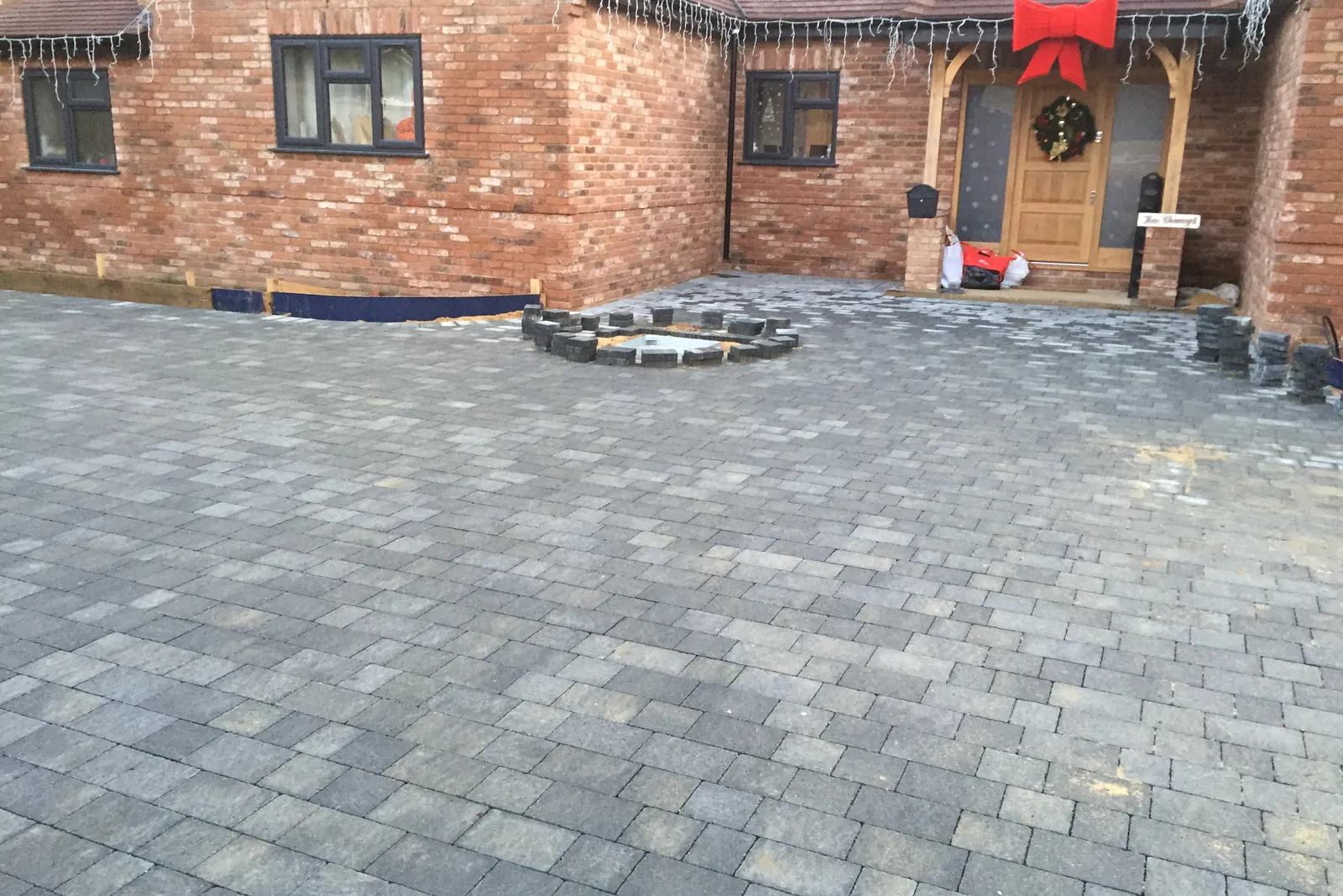 Setts laid across the front of the house, Virginia Water, 2017
