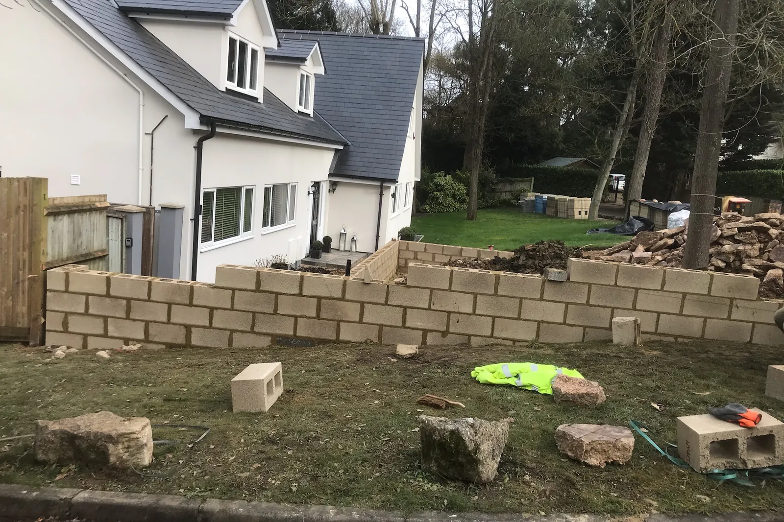 Block retaining wall going up round the new drive, Windsor, 2020