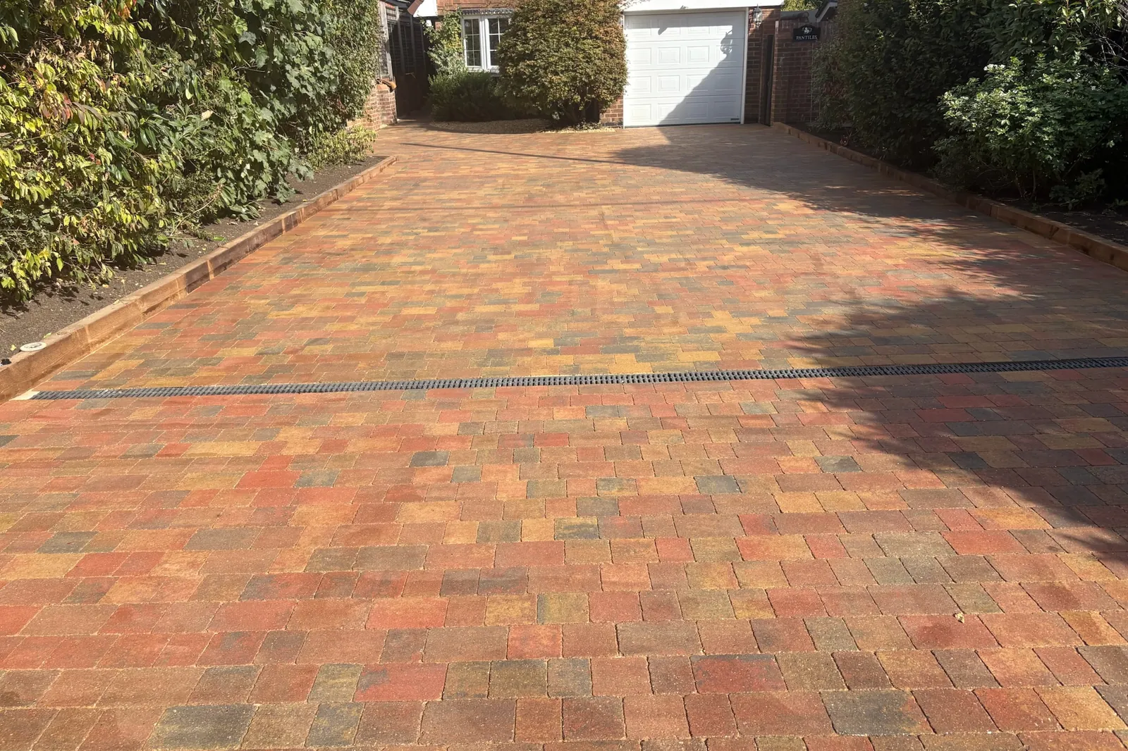 Red multi block paving drive with a channel drain, finished, Yateley, 2026