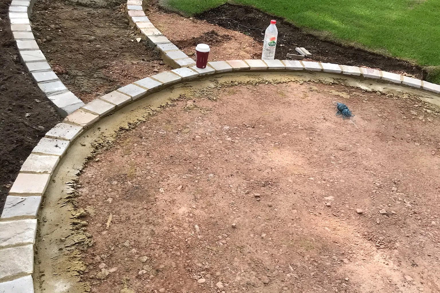 Curved setts edging laid and the first turf down, Farnham Royal, Slough, 2020