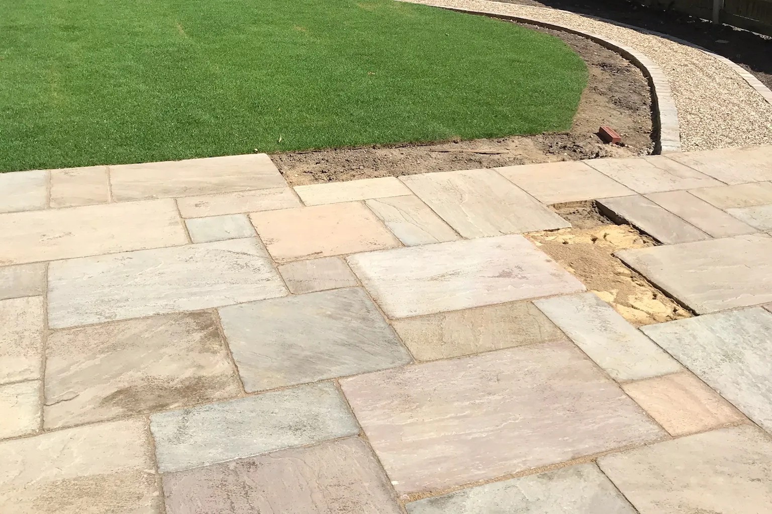Indian sandstone patio beside a new lawn, Farnham Royal, Slough, 2020