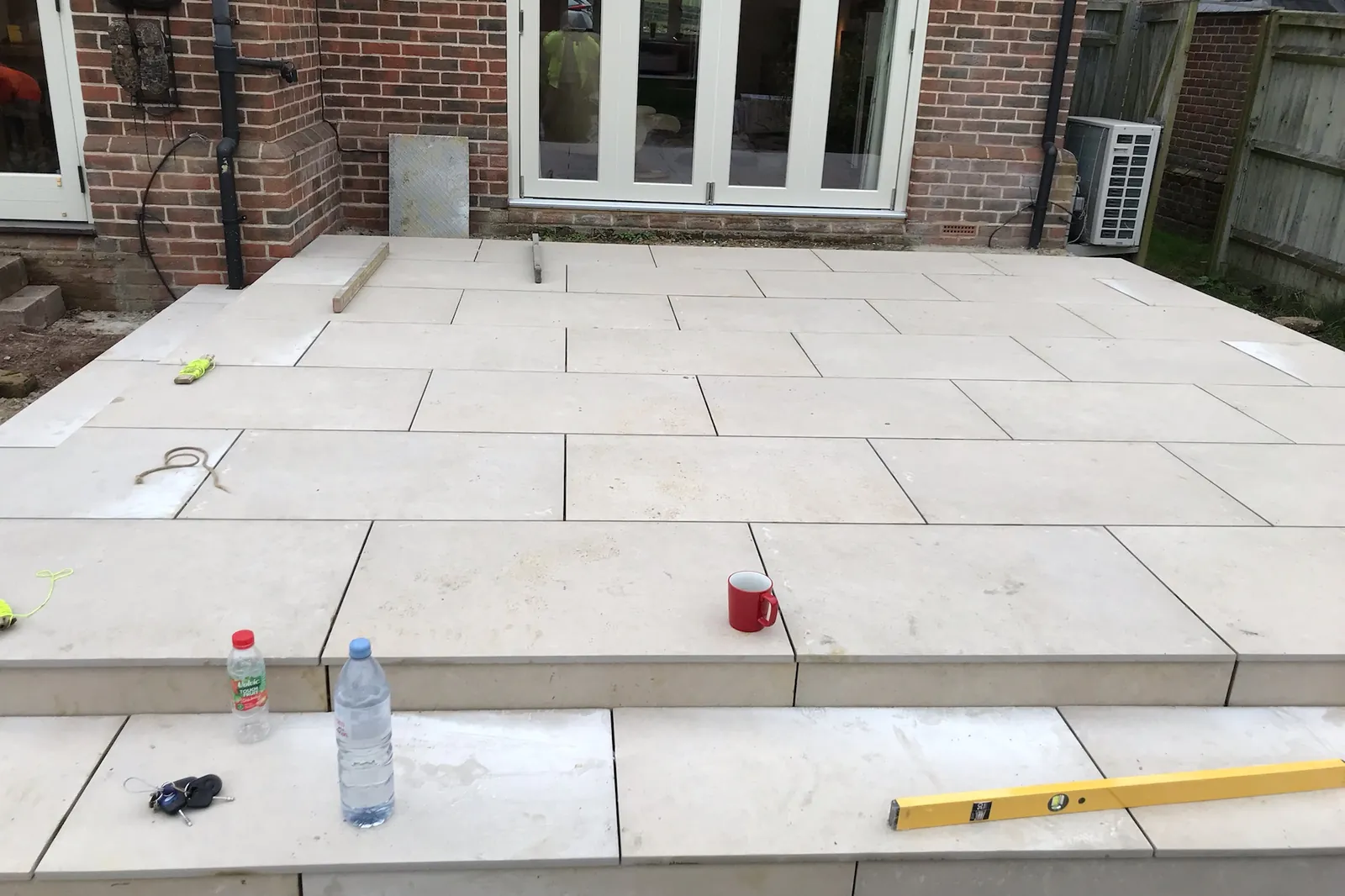 Porcelain slabs laid across the base, edges still open, Marlow, 2021