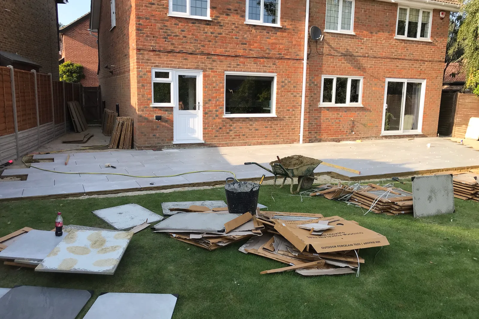 Porcelain slabs delivered and the first laid along the house, Wokingham, 2020