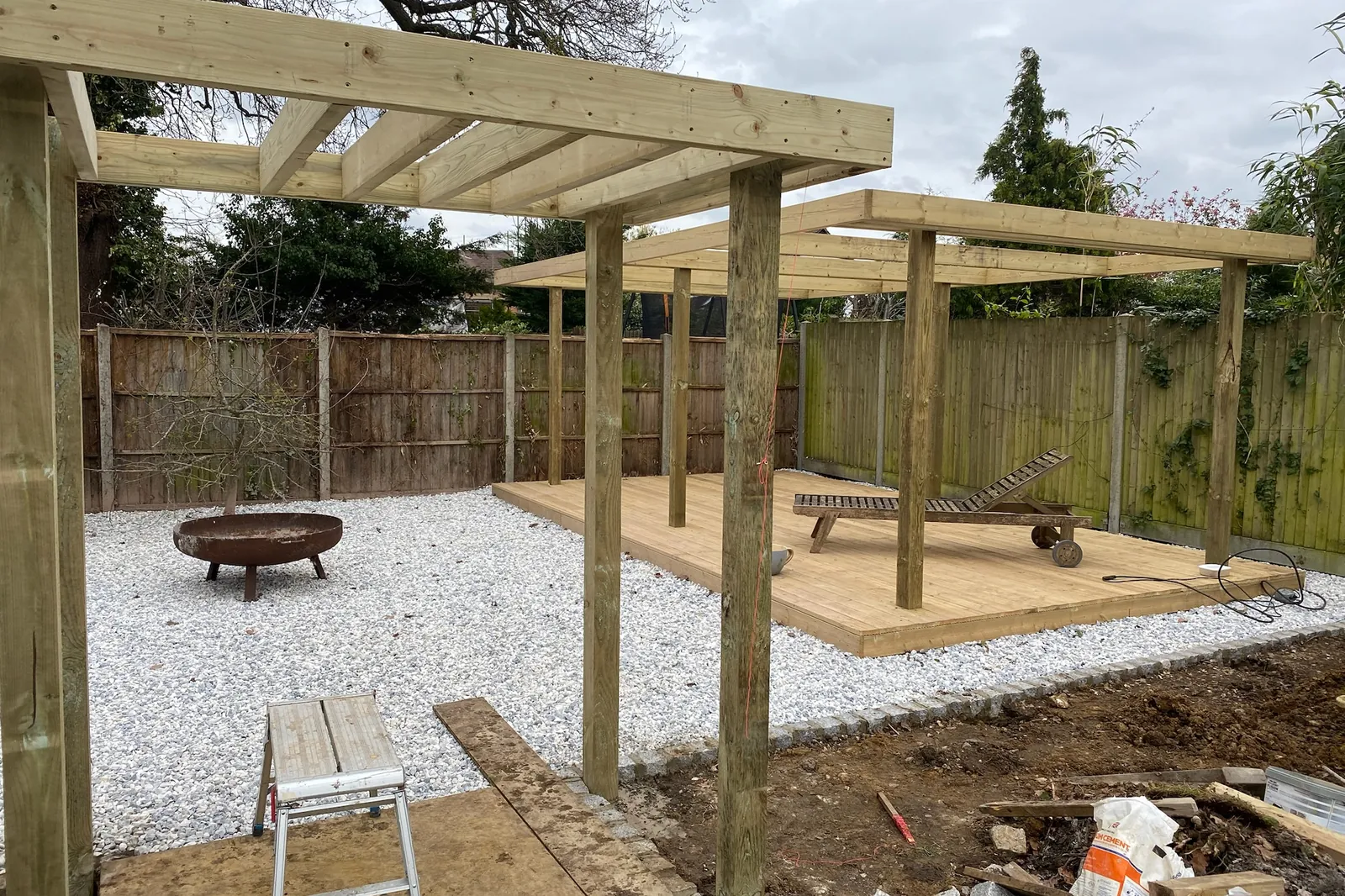 Deck and pergola frame up, the ground still open, Earley, Reading, 2024