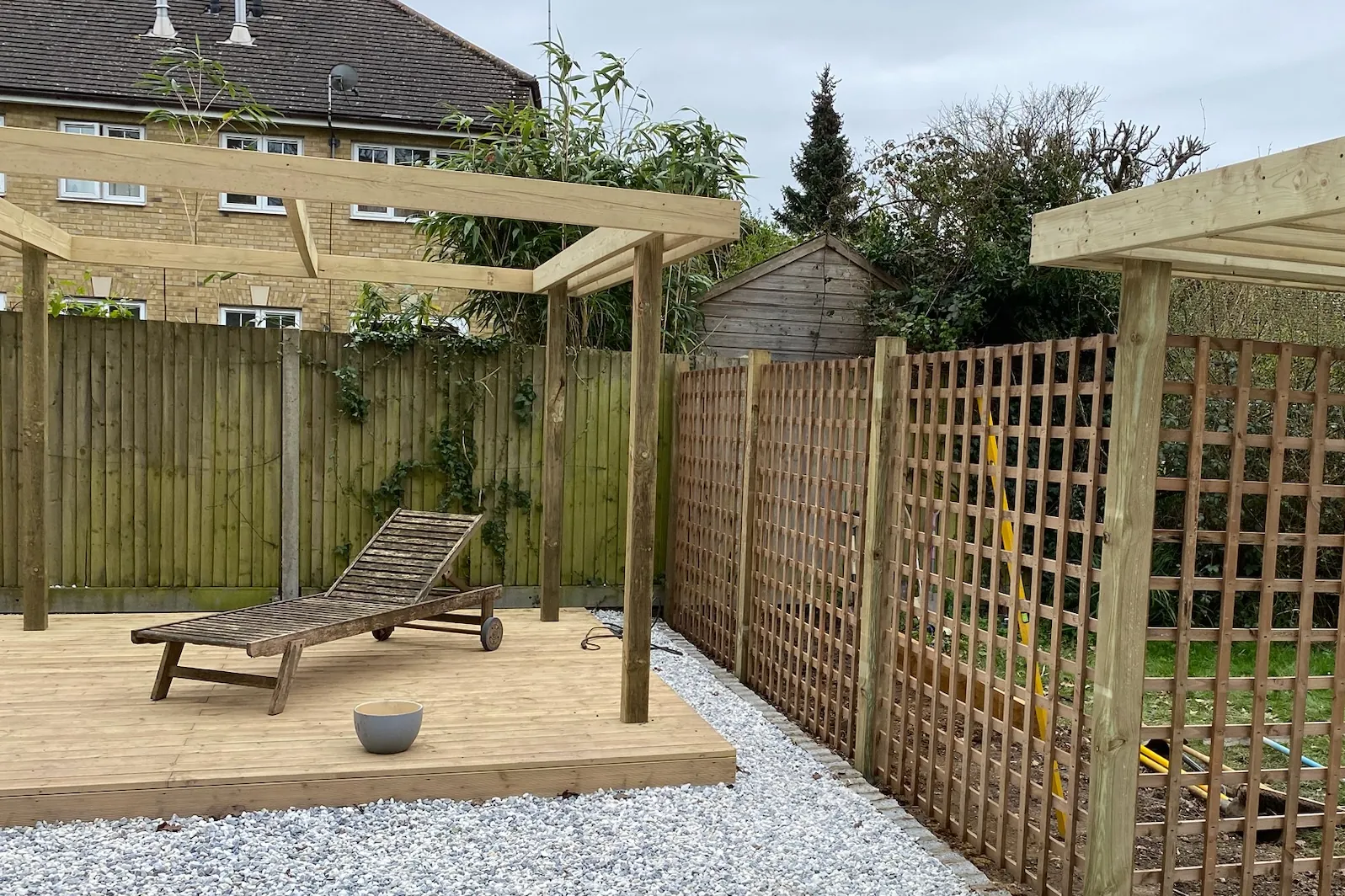 Trellis screens fixed and the gravel laid beside the deck, Earley, Reading, 2024