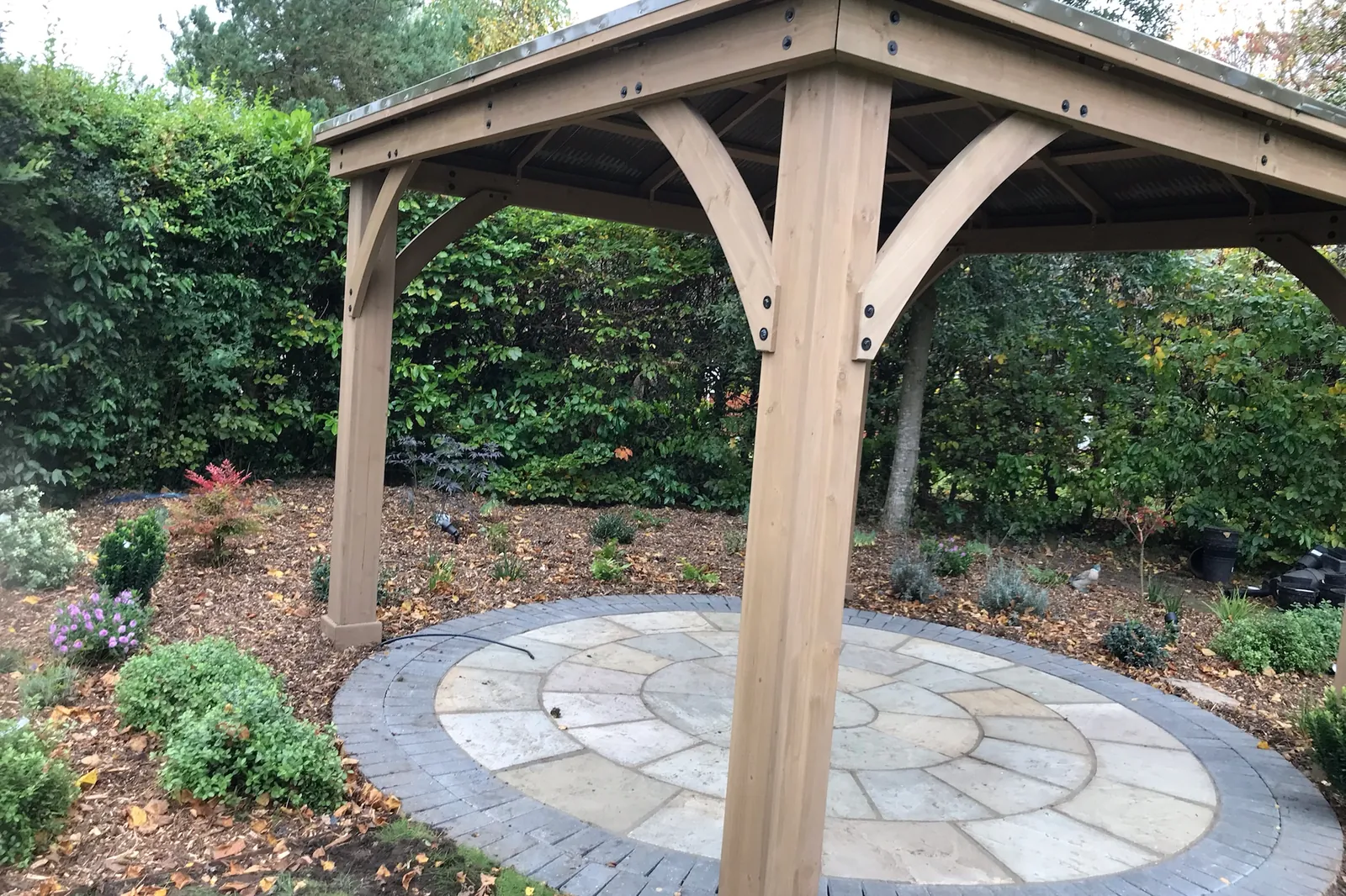 Roofed timber pergola finished with planting, Farnham Royal, Slough, 2021